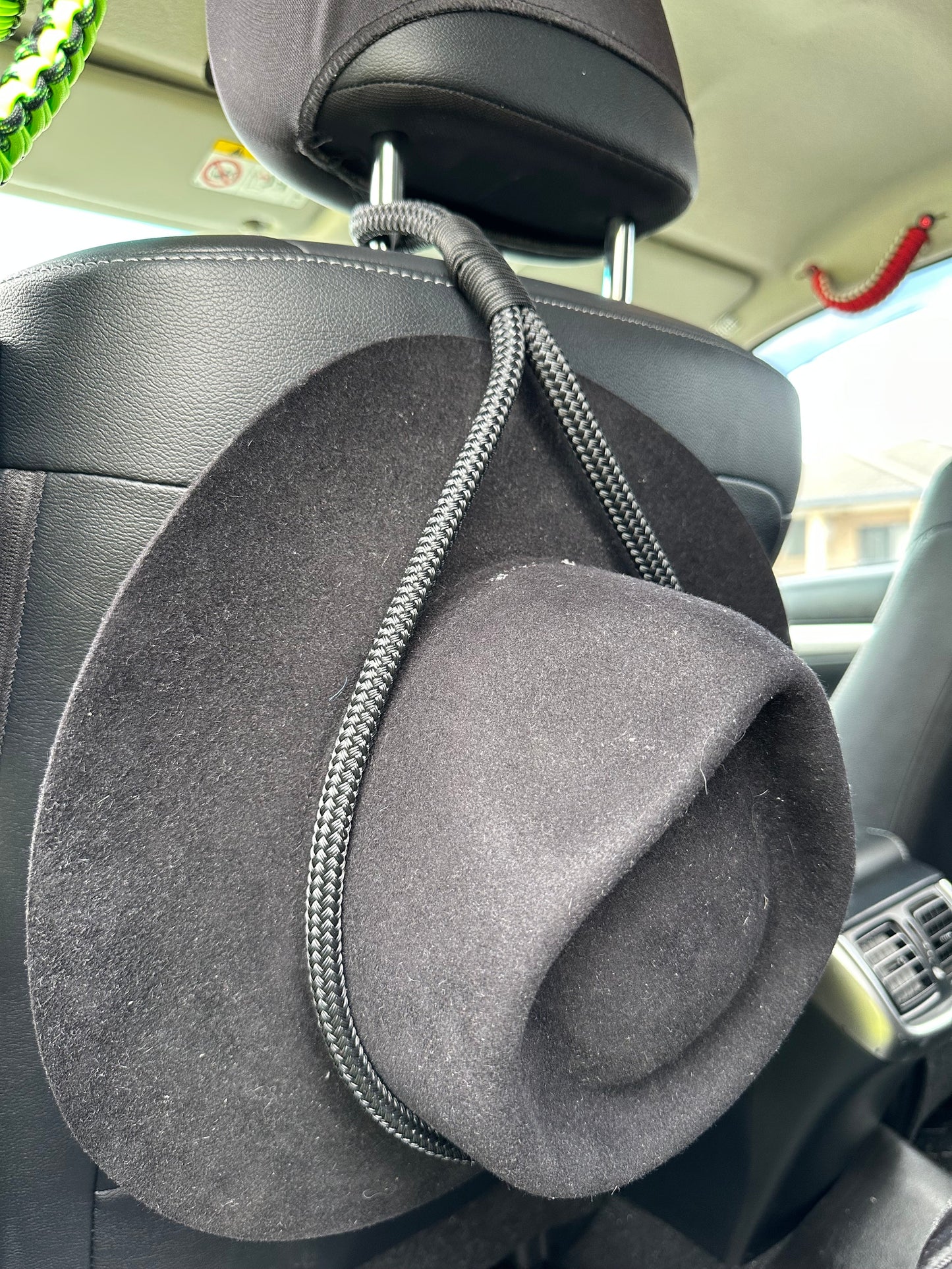 Headrest hat holder